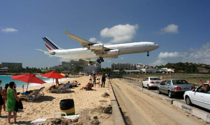Airplane spotting in St. Maarten on Maho beach